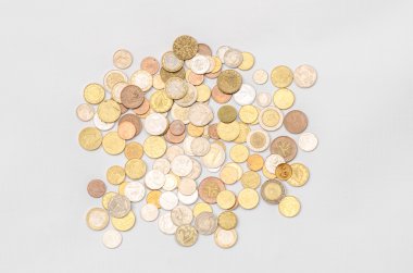 Money and Finance Topic: cash coins are isolated on a white background in the studio a top view