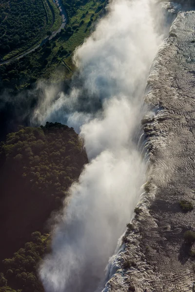 Letecký pohled na spreje skrývá Victoria Falls — Stock fotografie