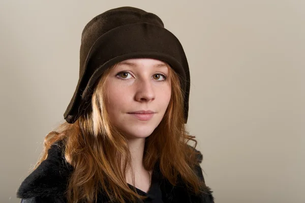 Redhead in brown cloche hat and jacket — Stock Photo, Image