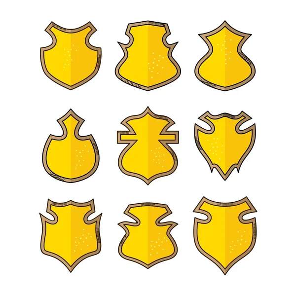 Conjunto de escudos dorados dibujados a mano — Vector de stock