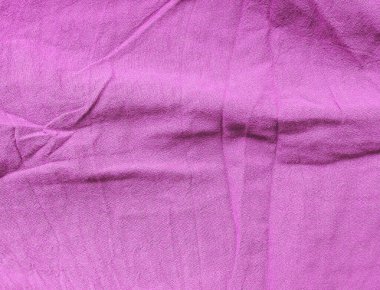 Pamuk kumaşın arkaplan dokusu pembe. Metnin ve tasarımın için uzayı kopyala. Tekstil konsepti ve yumuşak fon, düz la