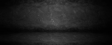 Dark board and black cement studio and showroom with shadows and backdrop background 
