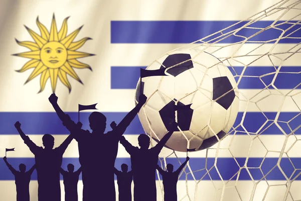 Silhouettes of Soccer fans with flag of Uruguay. Cheer Concept v — стоковое фото