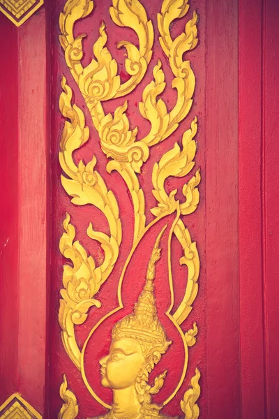 Traditional Thai style art gold painting pattern on the door vin — Stock Photo, Image