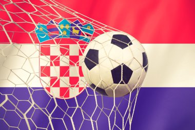 Hırvatistan bayrağı ve futbol topu hedef net vintage renkte sallayarak