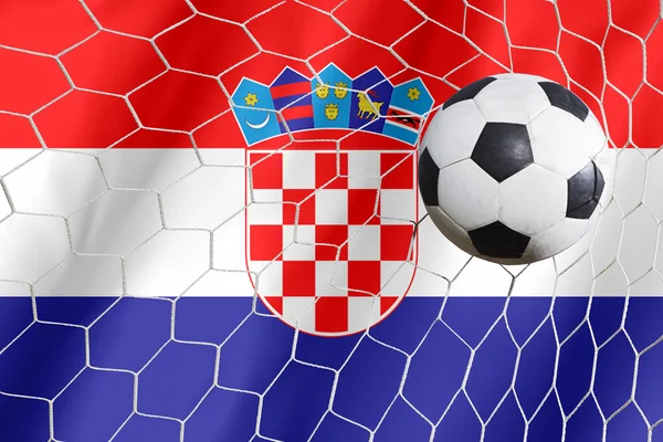Croacia ondeando bandera y pelota de fútbol en la red de gol —  Fotos de Stock
