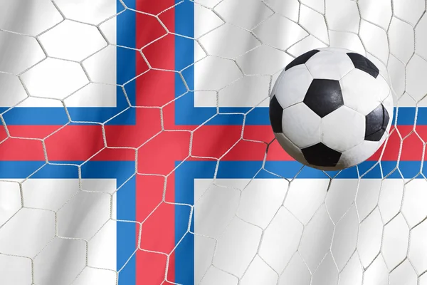 Bandera de las Islas Feroe y pelota de fútbol, fútbol en la red de goles —  Fotos de Stock