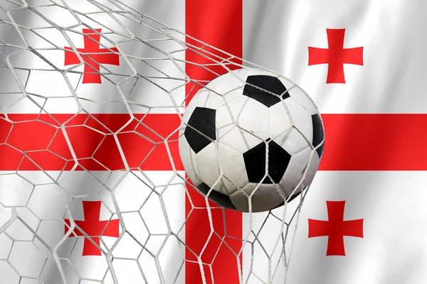 Georgien-Fahne und Fußball, Fußball im Tornetz — Stockfoto