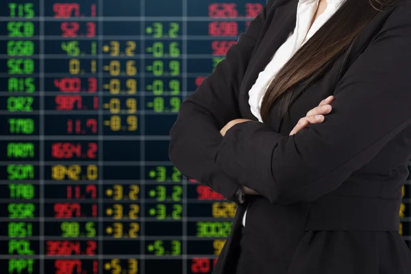 Business woman over stock exchange — Stock Photo, Image