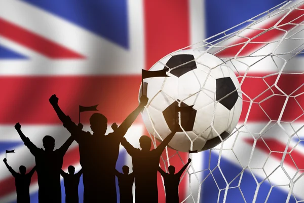 Silhouettes of Soccer fans with flag of United Kingdom.Cheer Con — Stock Photo, Image