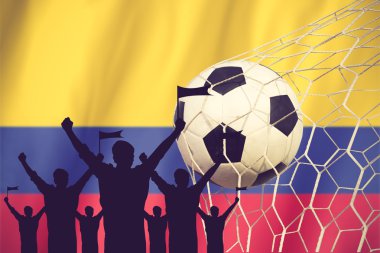 Columbia bayrağı ile siluetleri futbol fanlar. Tezahürat kavramı 
