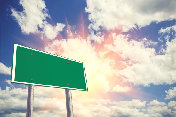 Blank freeway sign against a blue sky.Vintage color — Stock Photo, Image