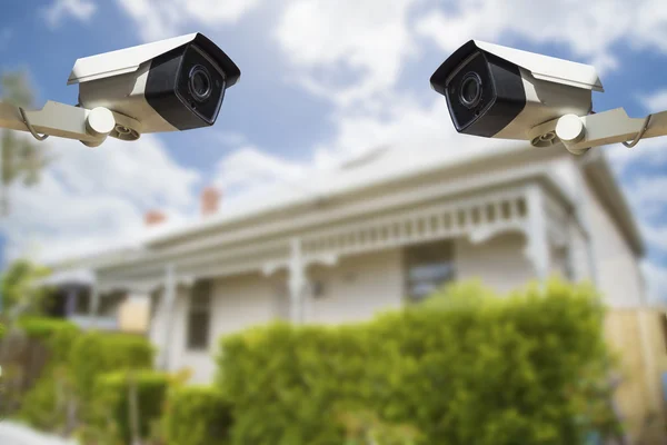 CCTV Security Camera with house in background — Stock Photo, Image