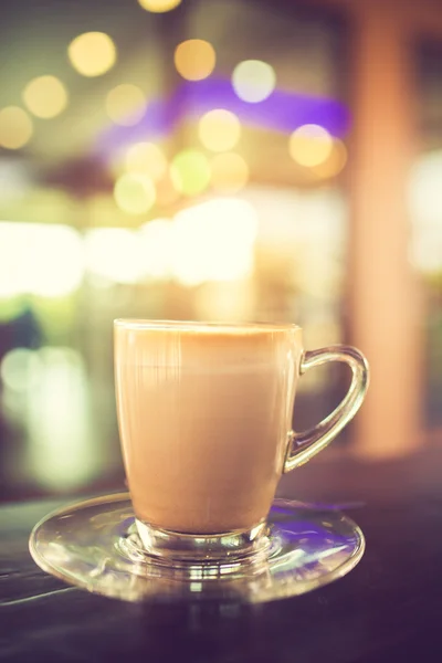 Närbild av en kopp kaffe på Coffee Shop. Vintage färg — Stockfoto