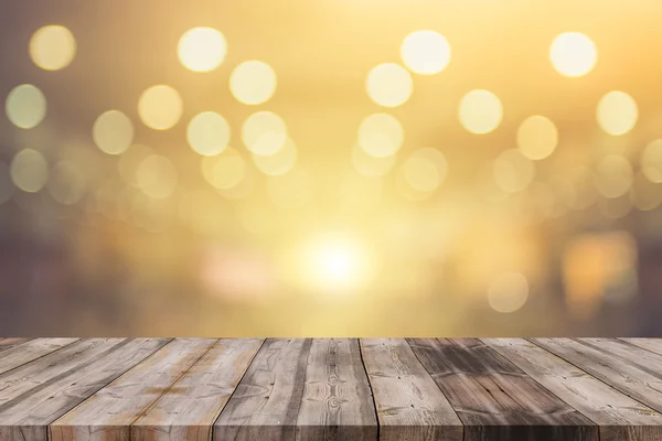 Wood table top on golden bokeh abstract background - can be used — Stock Photo, Image