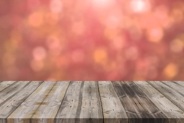 Piano in legno su sfondo rosso bokeh astratto - può essere utilizzato per — Foto Stock