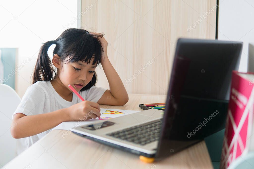 Asian girl student online learning class study online with laptop at home.