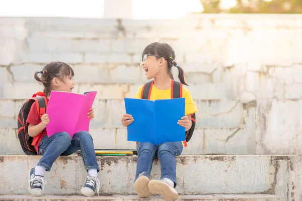 Little Girl Sister Reading Book Together Adorable Asian Kids Enjoying — Zdjęcie stockowe