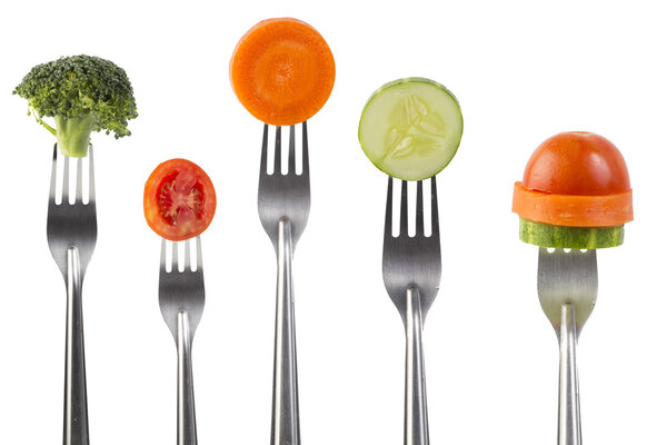 vegetables on the collection of forks, diet concept