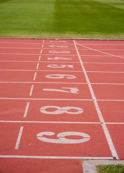 Numbers on running track  in stadium — Stock Photo, Image