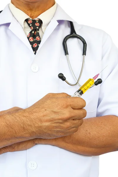 Asian doctor is holding syringe — Stock Photo, Image