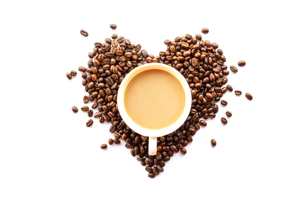 Hartvormige van koffiebonen en cup — Stockfoto