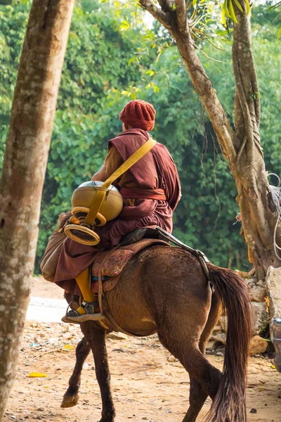 Buddhist monk ride horse — Stock Photo, Image