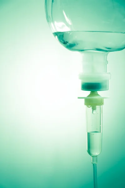 Saline solution in vignette style — Stock Photo, Image