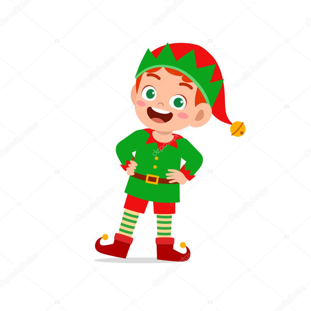 happy cute little kid boy and girl wearing green elf christmas costume