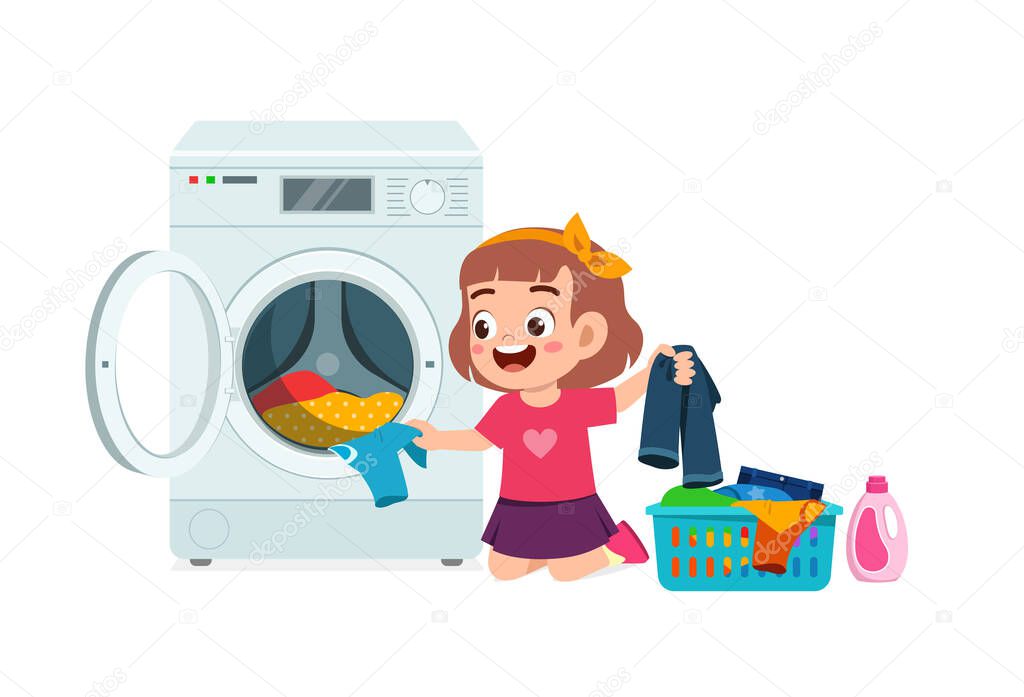 happy cute kid do laundry with washing machine