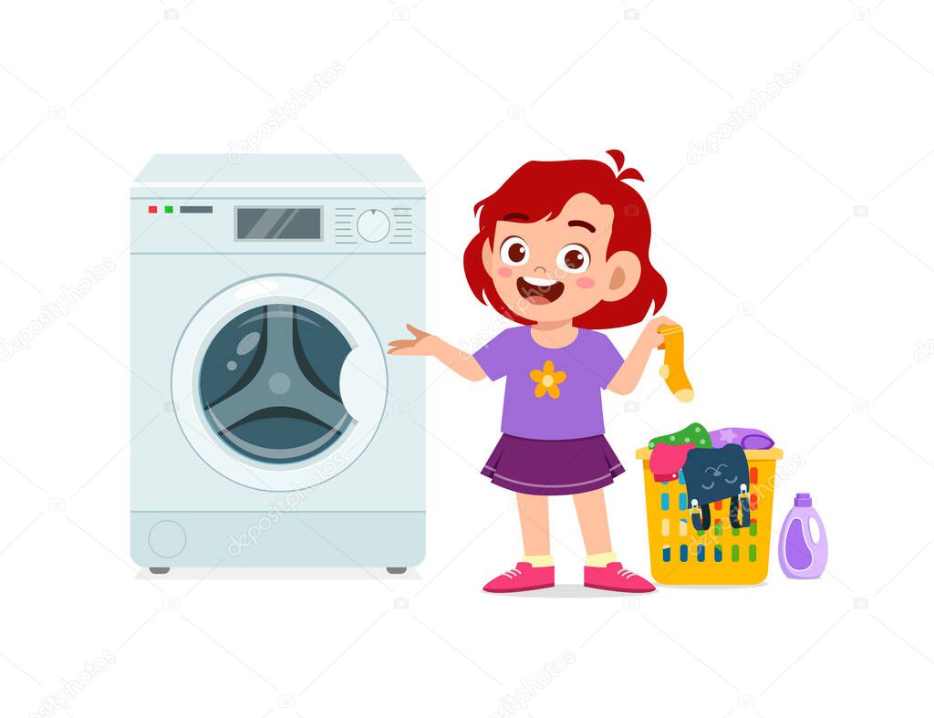happy cute kid do laundry with washing machine