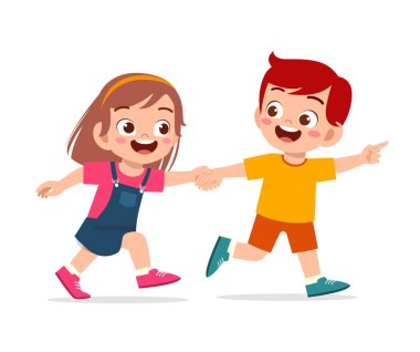 Sevimli küçük oğlan ve kız el ele tutuşup birlikte yürüyorlar.