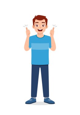 young good looking man doing thumb up pose