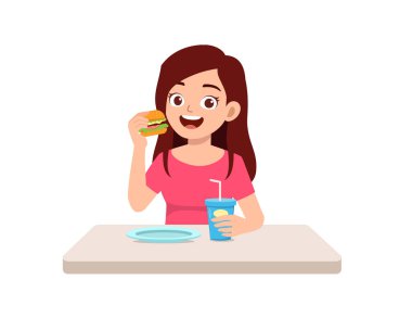 young good looking woman eat unhealthy fast food