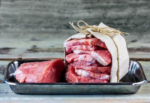 Raw Meat Slices on Wooden Background — Stock Photo, Image