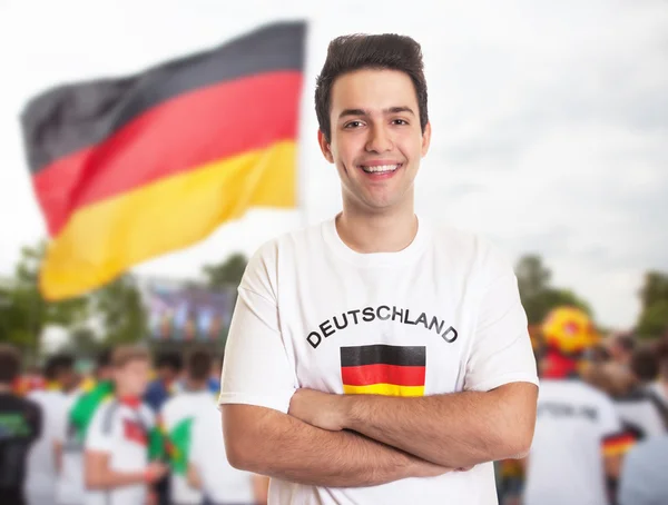 German fan with dark hair with other fans — Stock Photo, Image