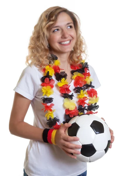 Γερμανική γυναικείο ποδόσφαιρο ανεμιστήρα με μπάλα ψάχνει προς τα πλάγια — Φωτογραφία Αρχείου
