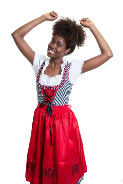 African american vrouw met Beierse oktoberfest jurk dansen — Stockfoto