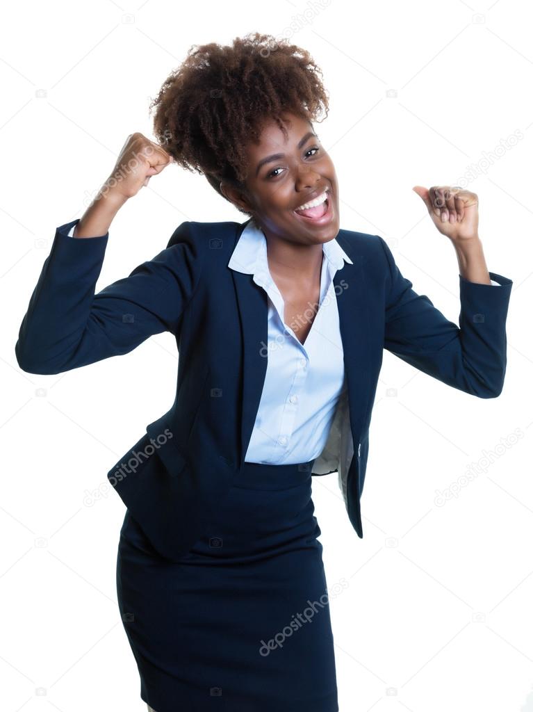 Cheering american business woman pointing at camera