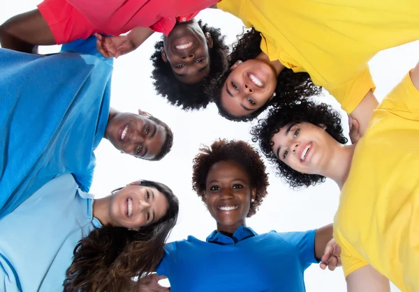 Group of mixed race young adults in a circle — Stock Photo, Image