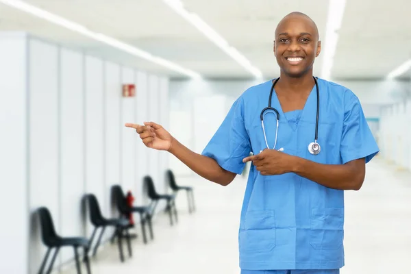 Pointing Mature Adult African American Male Nurse Vaccination Station Vacinating — Stock Photo, Image