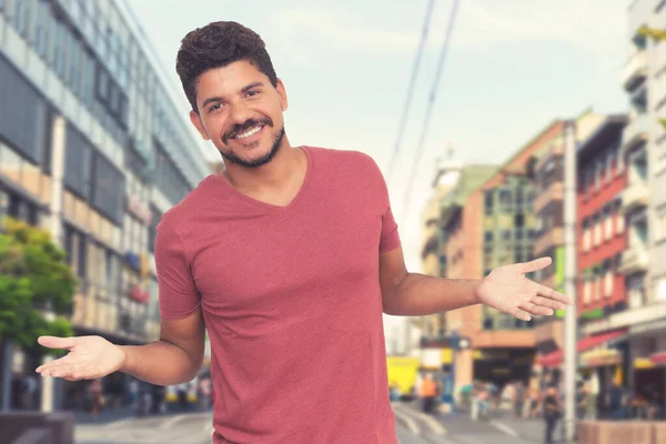 Modern italian man with beard outdoor in summer in city