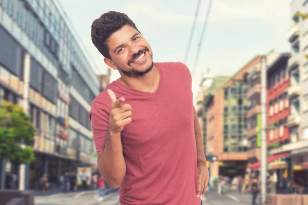 Happy italian man with beard outdoor in summer in city