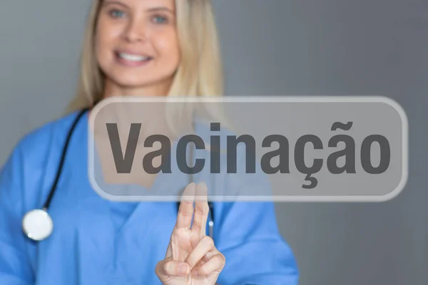 Female Doctor Touching Screen Brazilian Portuguese Word Vaccination Symbol Immunization — Stok fotoğraf