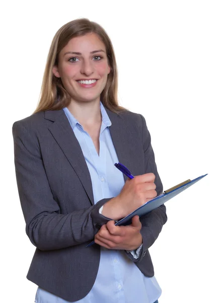 Attractive german businesswoman with clipboard — Stockfoto