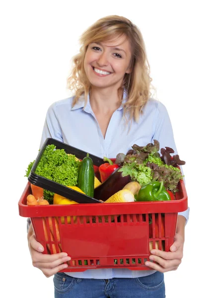 Mujer atractiva con cabello rubio comprando comida saludable — Foto de Stock