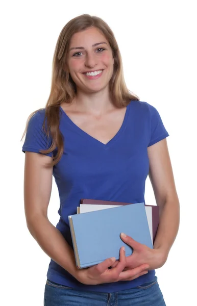 Lachende Studentin mit blonden Haaren und Büchern — Stockfoto