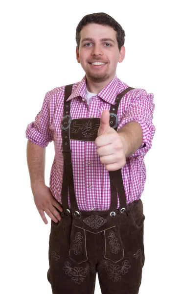 Besucher des bayerischen Oktoberfestes zeigt Daumen hoch — Stockfoto