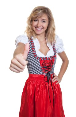 German woman in a traditional bavarian dirndl showing thumb up clipart