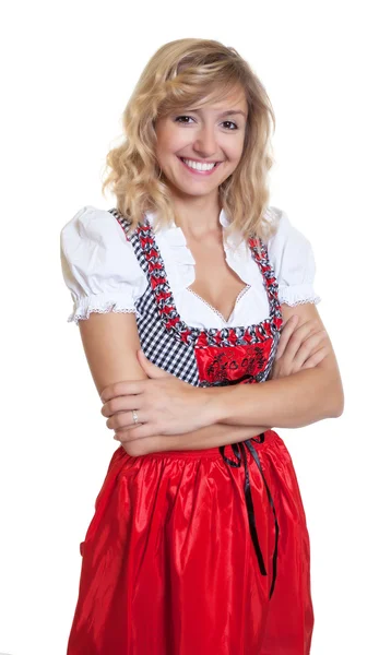 Tyska kvinnan med korsade armar i en traditionell bayersk dirndl — Stockfoto